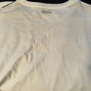 Versace Collection , men tshirt color white with design on collar.